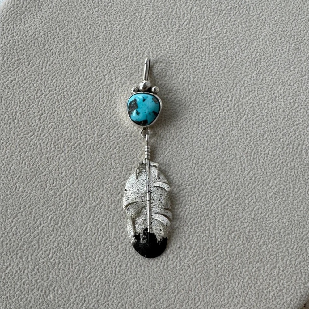 Navajo turquoise sterling silver feather pendant